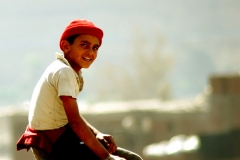 abeer_maadawy_boy_in_red_hat__2007_photograph_cm__50_x_50_egitto