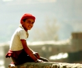 abeer_maadawy_boy_in_red_hat__2007_photograph_cm__50_x_50_egitto
